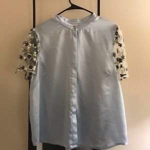 Satiny sky blue blouse with floral lace sleeves